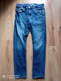 Spodnie męskie jeansowe Calvin Klein CKJ 026 SLIM