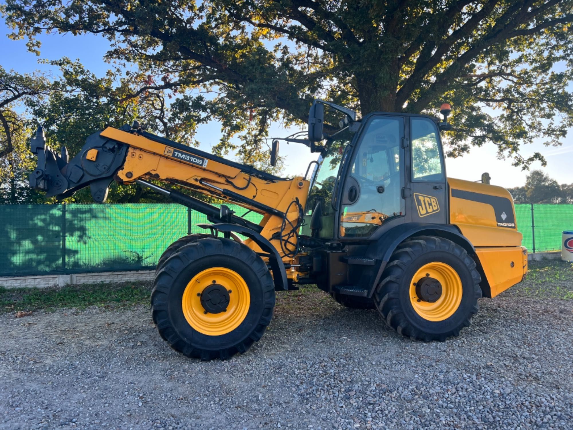 Ładowarka teleskopowa przegubowa Jcb TM 310S tm310s Agri