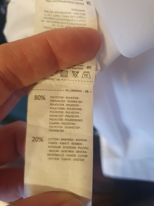 Zestaw ubrań damskich w rozmiarze L. Składy widoczne na zdjęciach.