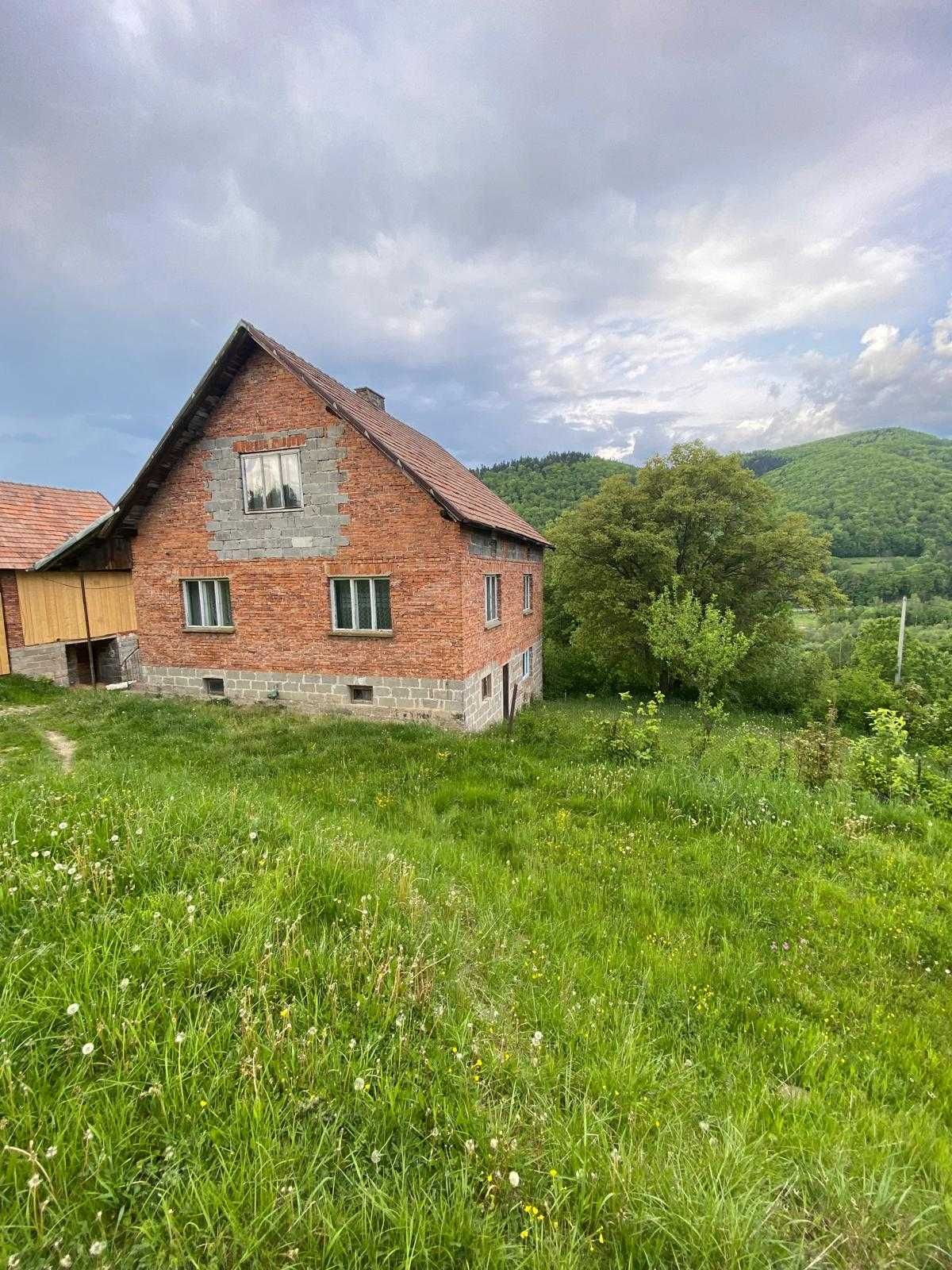 Działka budowlana wraz z zabudowaniami