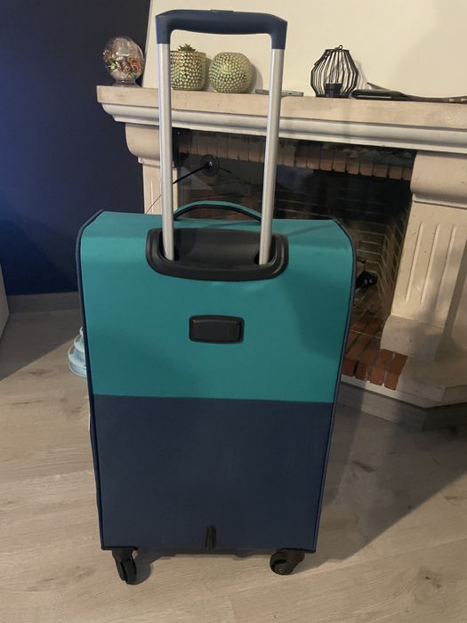 Mala de viagem de marca Pack it com a cor azul/verde a