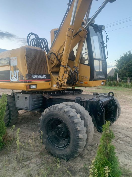 Koparka kołowa CAT M315 - 1996 rok - 15331 mh