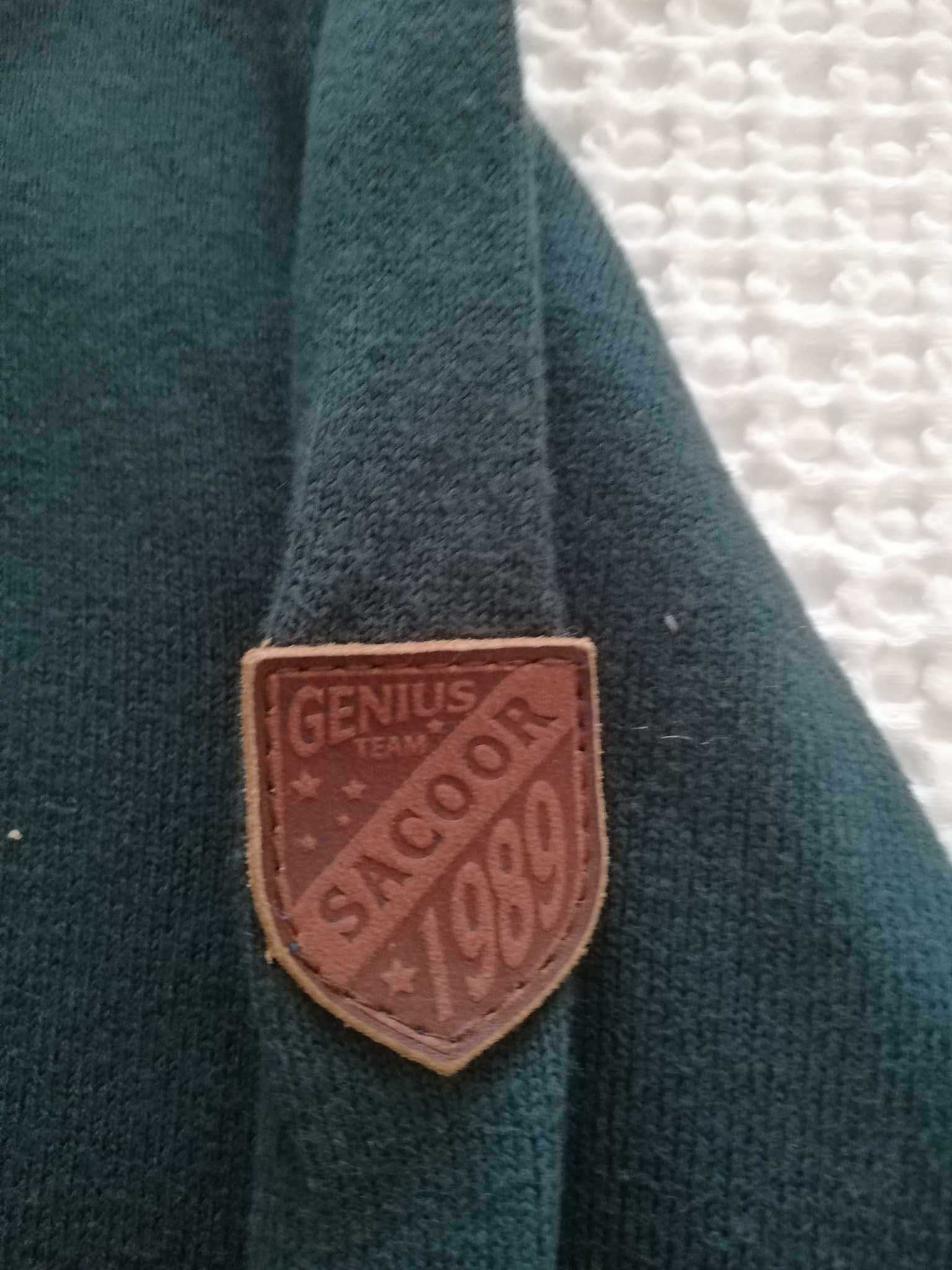 Camisola Sacoor, verde, detalhe com fecho na gola, tamanho 12 anos.