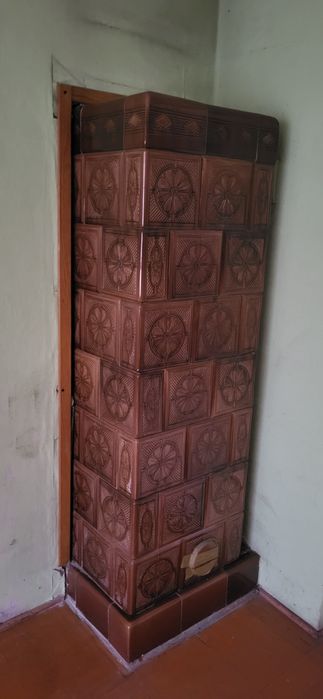 Piec kaflowy , koza