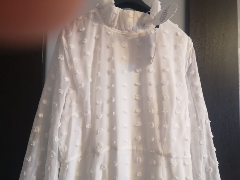 Biała sukienka boho