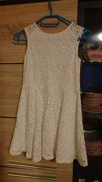 Biała sukienka r. 140