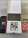 Nintendo Switch Oled + Case i case na gry oraz 2 gry za darmo