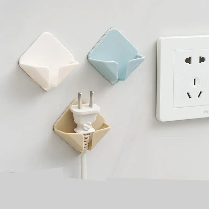 Тримач для розетки