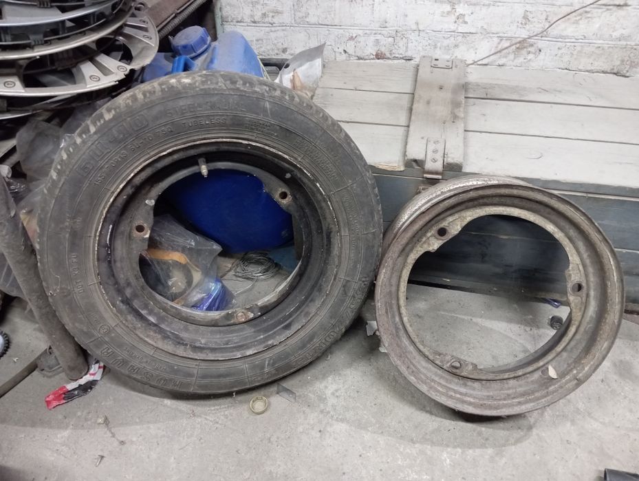 Диск Таврия ,ваз,Опель,Митсубиси,форд фиеста . Колпаки 15 .запаска