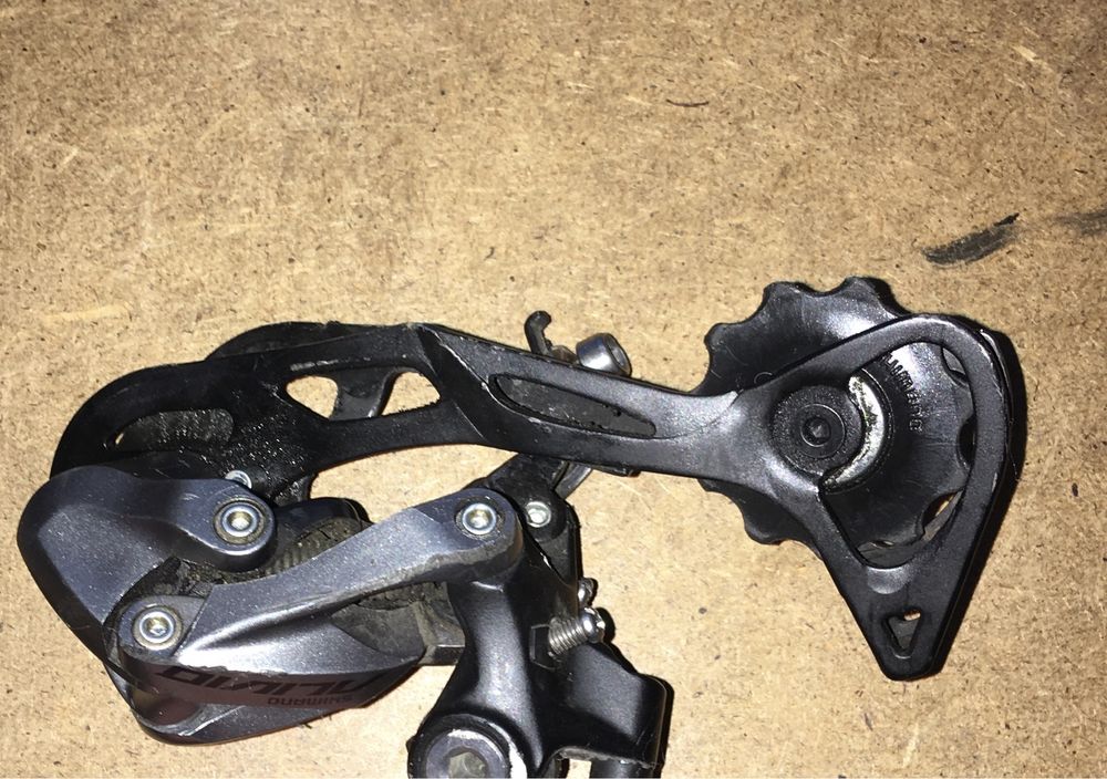 SHIMANO RD-M3100  Przerzutka tylna Shimano Alivio SGS (długi) 9 rz.