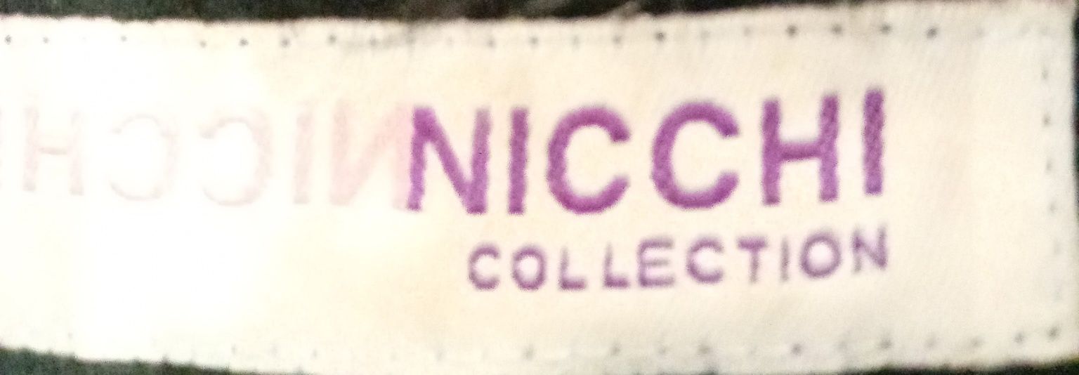 Casaco comprido da marca NICCHi