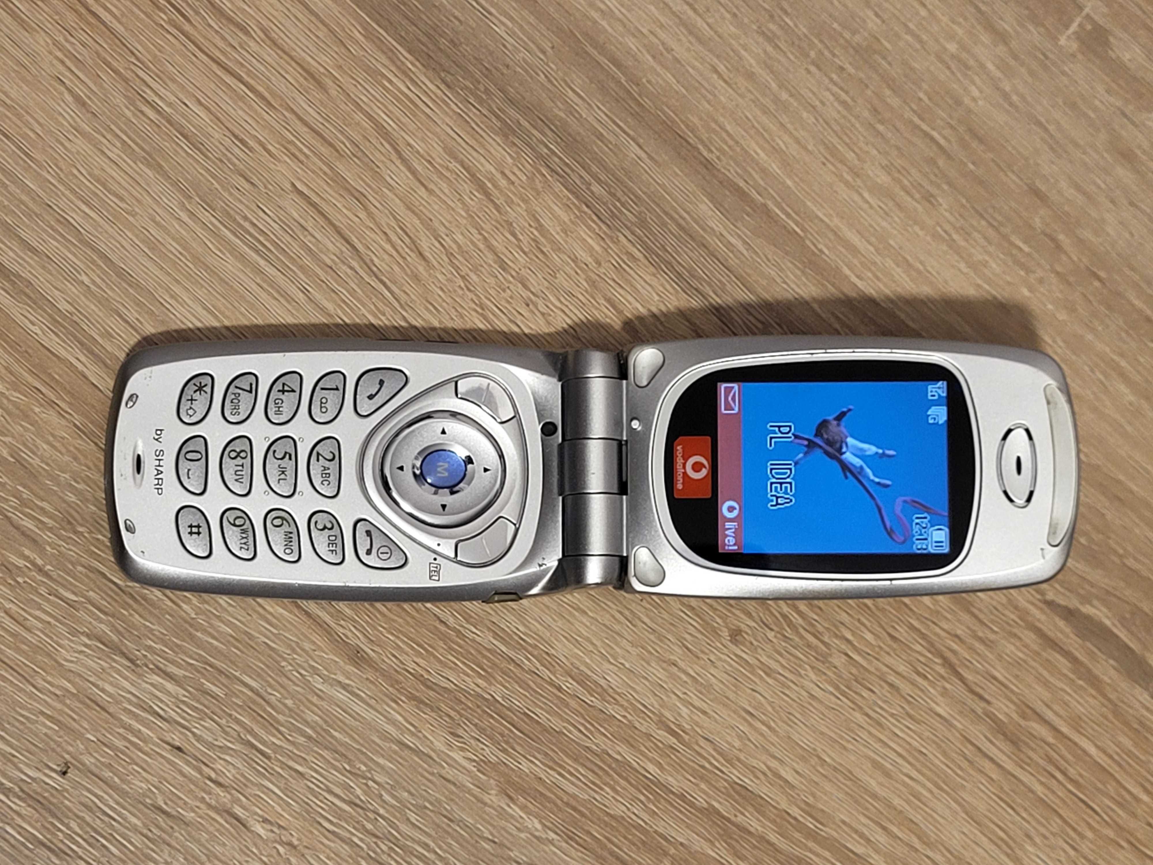 Telefon Sharp GX10 bateria ładowarka zestaw stary telefon