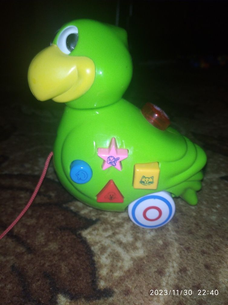 інтерактивна розвиваюча іграшка музичний папуга