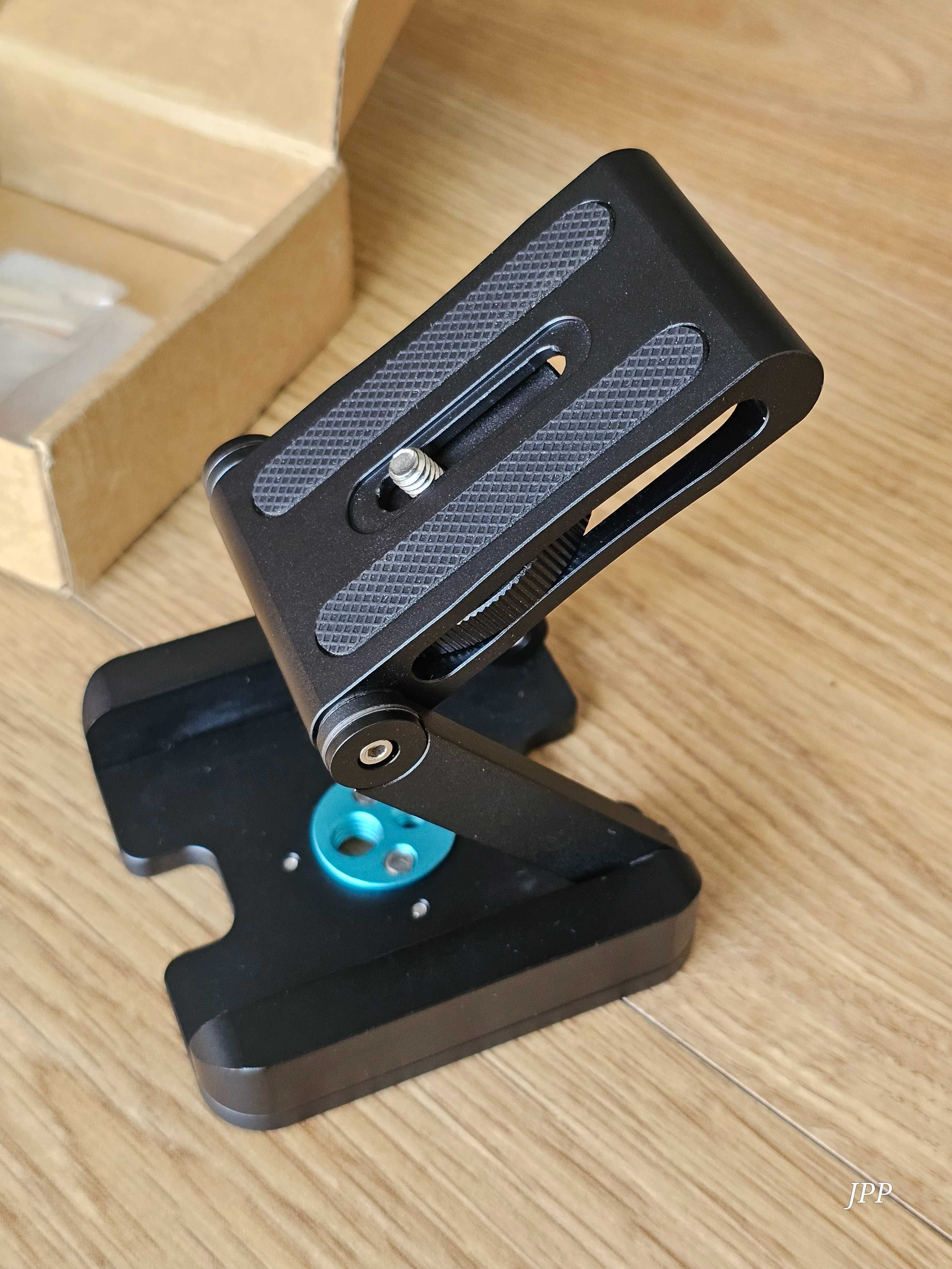 Base articulável com bolha de nível para máquina fotográfica/vídeo