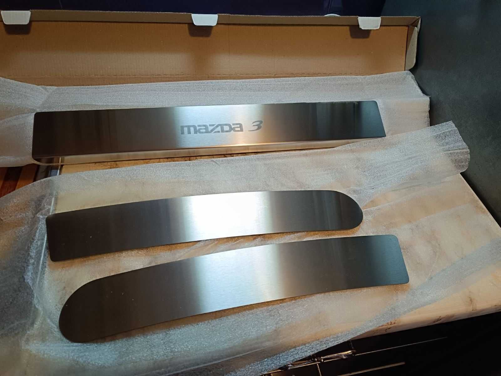Продам металлические накладки на МАЗДУ
