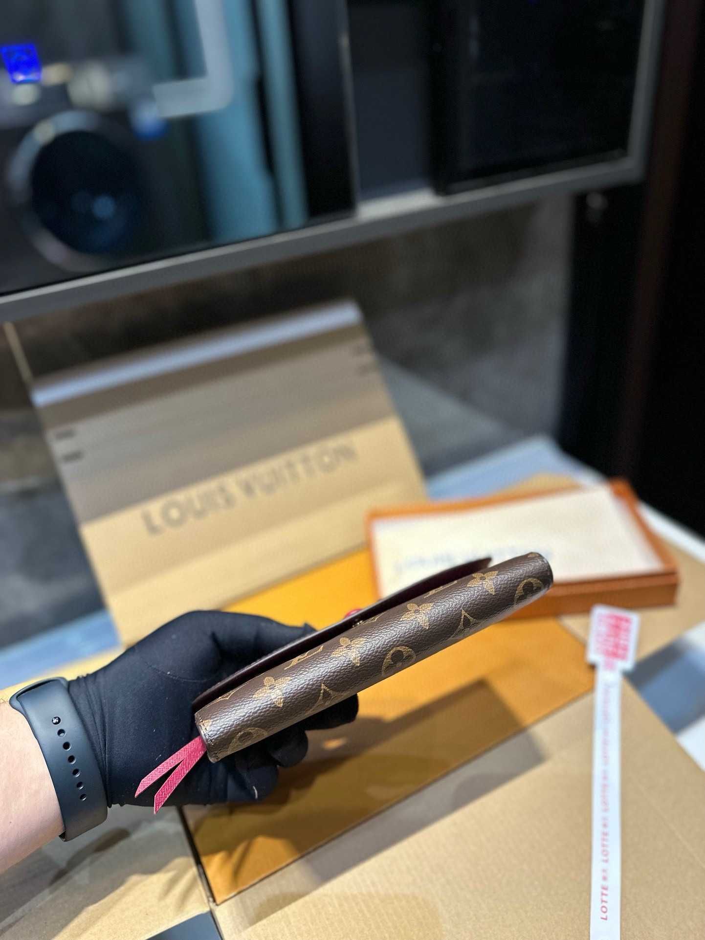 LV Emilie Sunrise purses