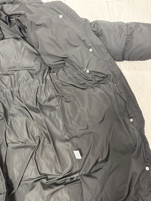 Продам пуховик чорний довгий