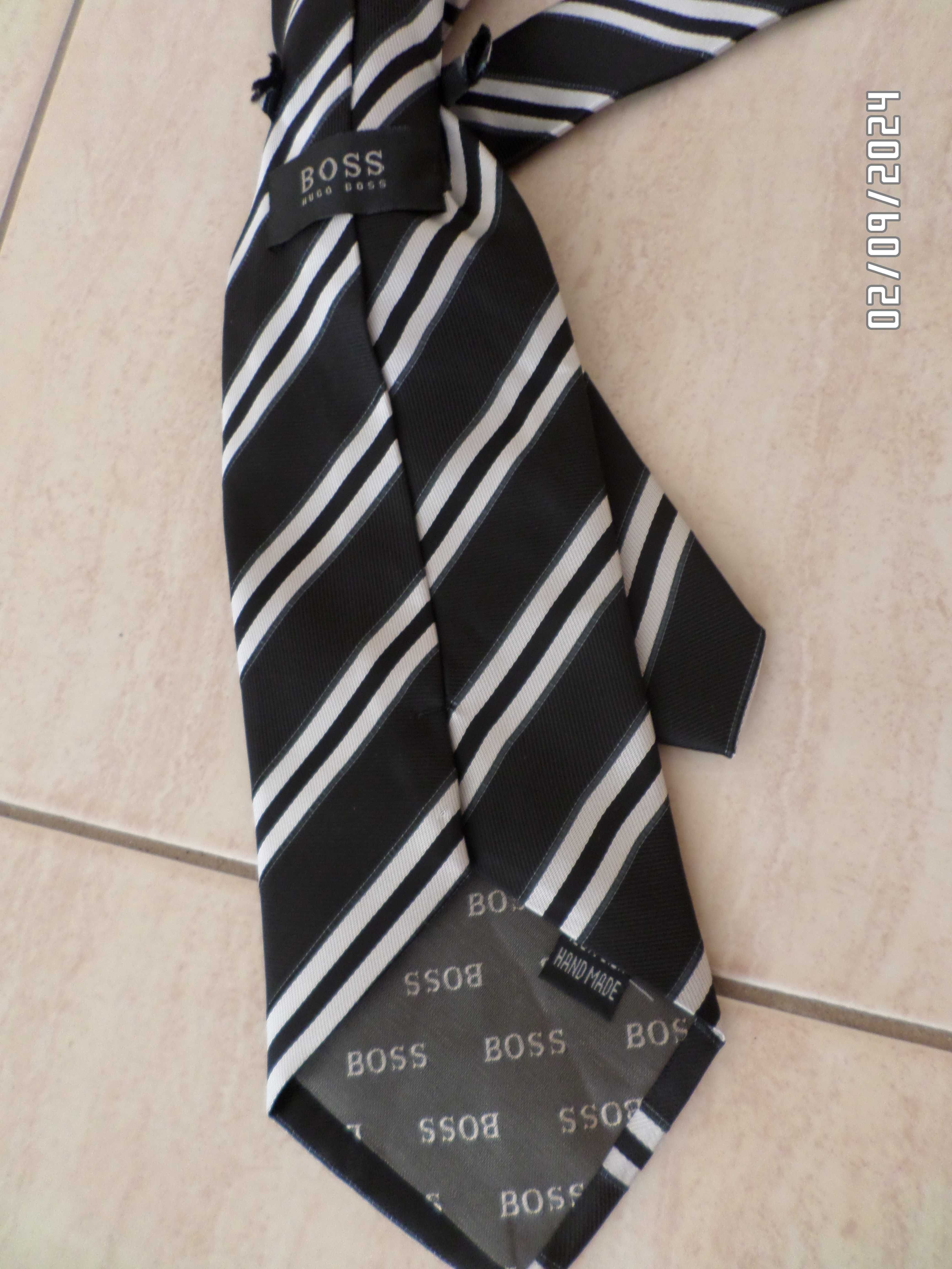 Męski firmowy krawat marki HUGO BOSS , wykonany z jedwabiu.