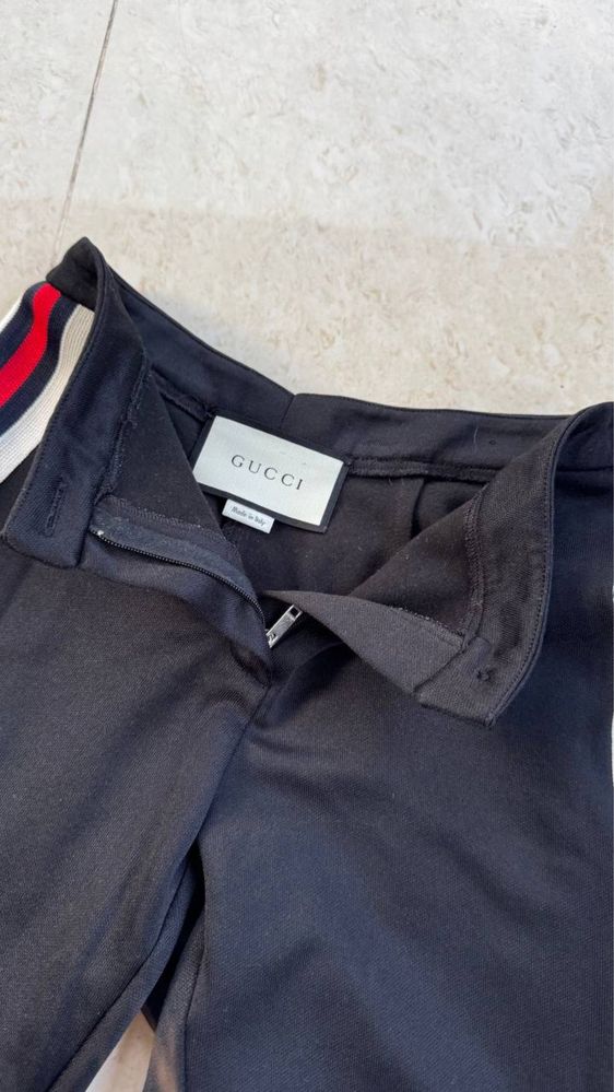 Штани Gucci.