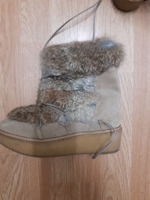 Botas de neve em pele  - em estado novo