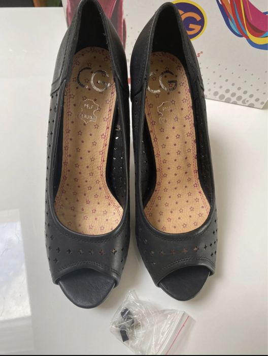 Sapatos de salto alto