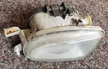 Halogen reflektor Mercedes W170 SLK lampa Hella lewy