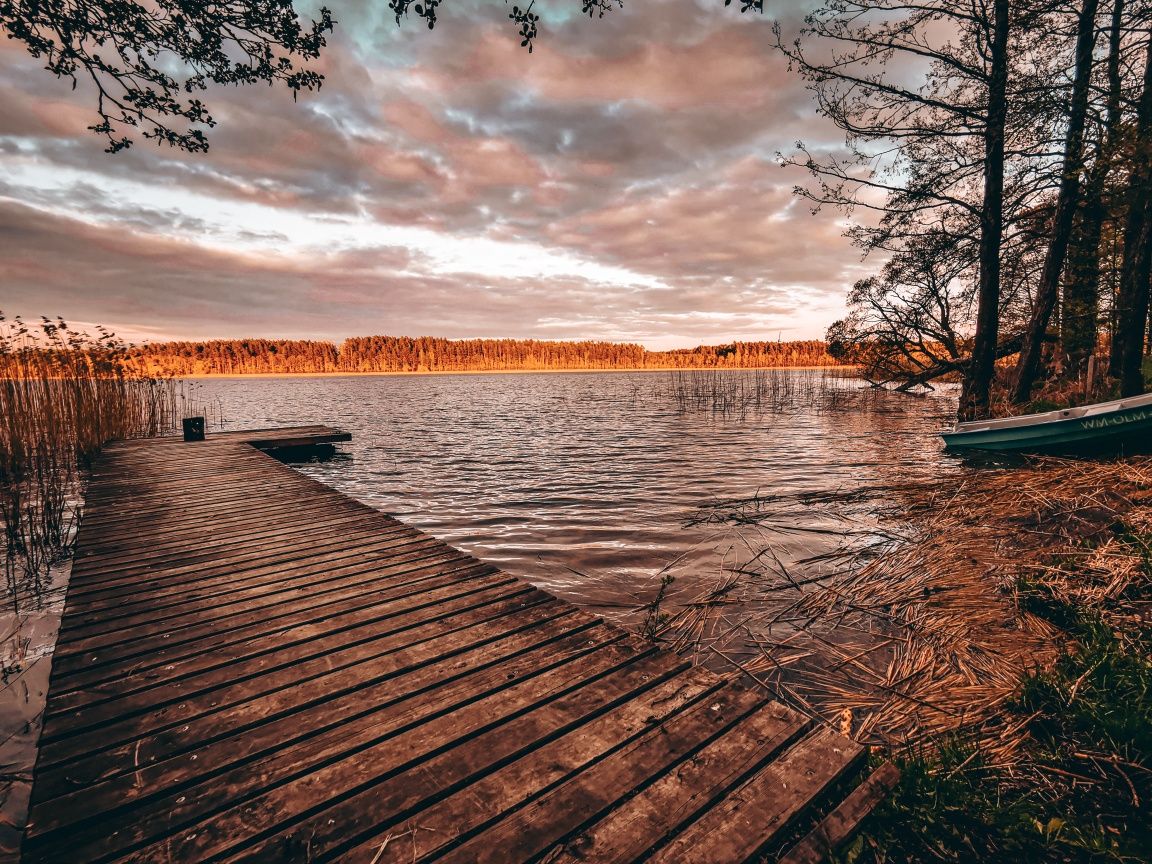 Dom linia brzegowa bania jacuzzi sup Mazury łódka kominek plaża Grill