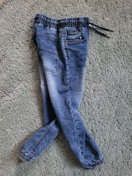 Spodnie typu jogger r. 122 reserved stan idealny