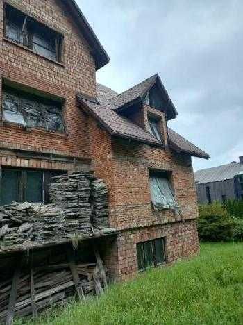 Kraków. Wola Justowska. Działka z domem w stanie surowym.