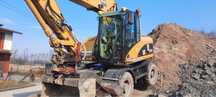 Koparka kołowa obrotowa CAT M315 C rototilt