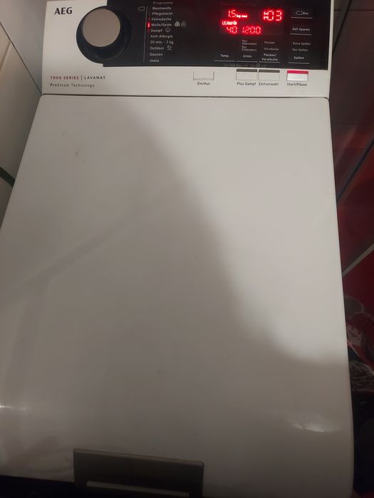 Пральна машина Aeg 7000 з функцією відпарювання