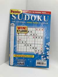 Revista com puzzles Sudoku e outros