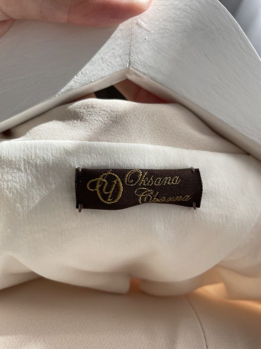 Костюм брючний молочний