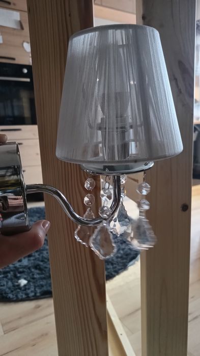 Żyrandol kryształowy i kinkiet