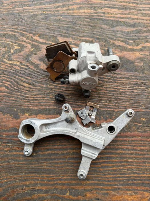 komplet nissin zacisk z jarzmem tylna ty kawasaki kxf klx 250 / 450 kx