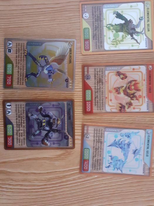 5 Cartas Invizimals DIAMANTE – Uberjackal + Elementais (raras e origin