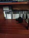 Playstation 2 com cerca de 50 jogos