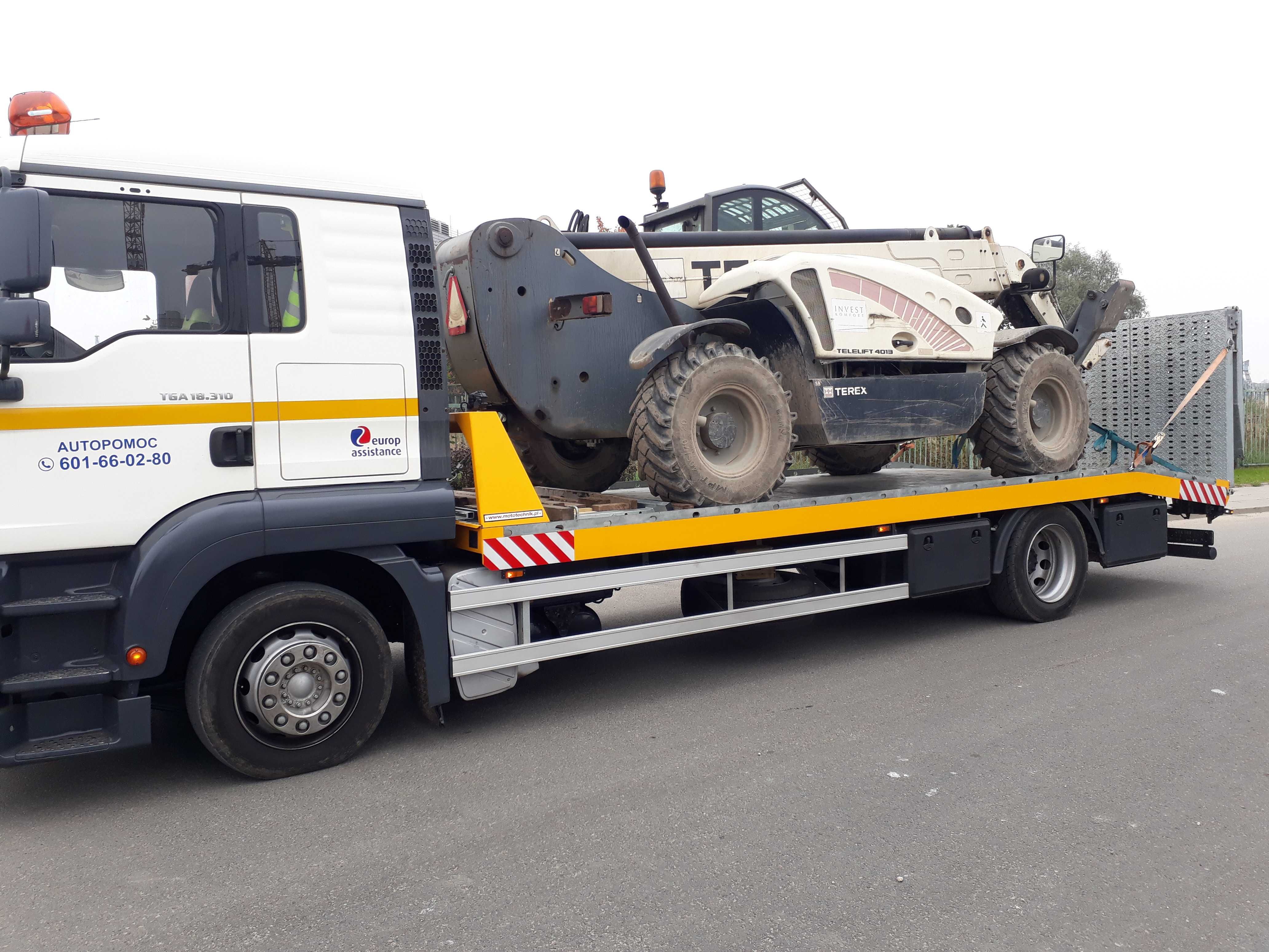 Transport maszyn budowlanych rolniczych wózków widłowych  holowanie