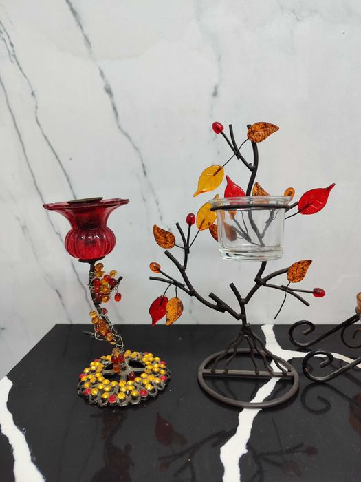 4 castiçais/porta velas