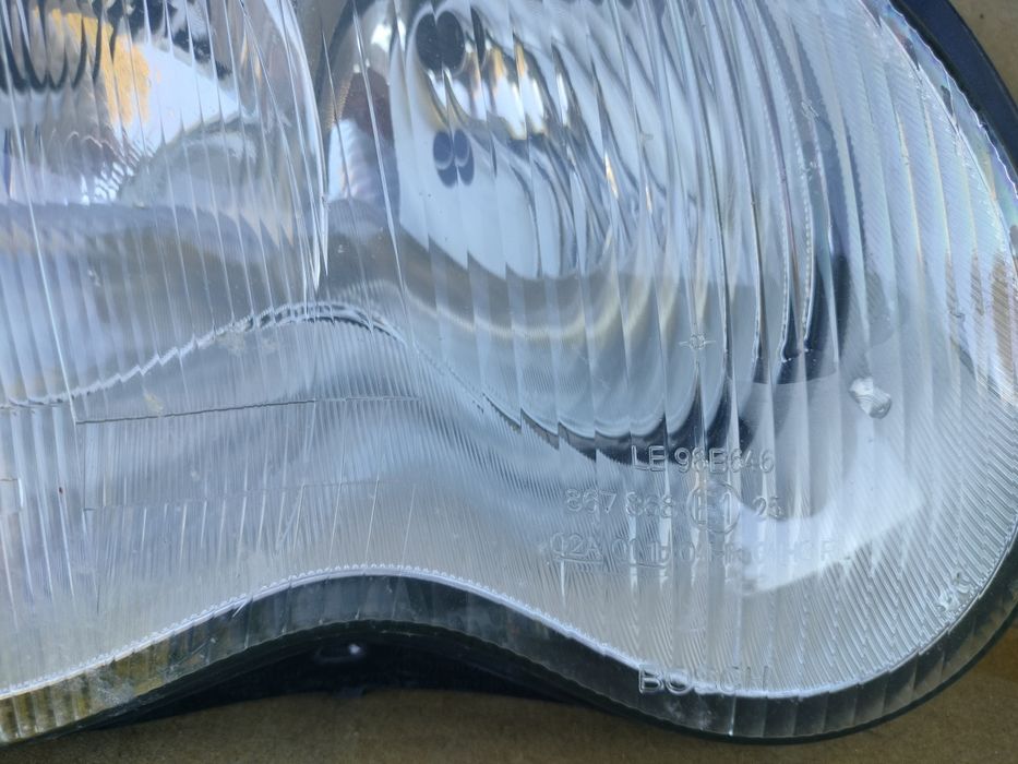 Óptica esquerda Mercedes w203 bosch