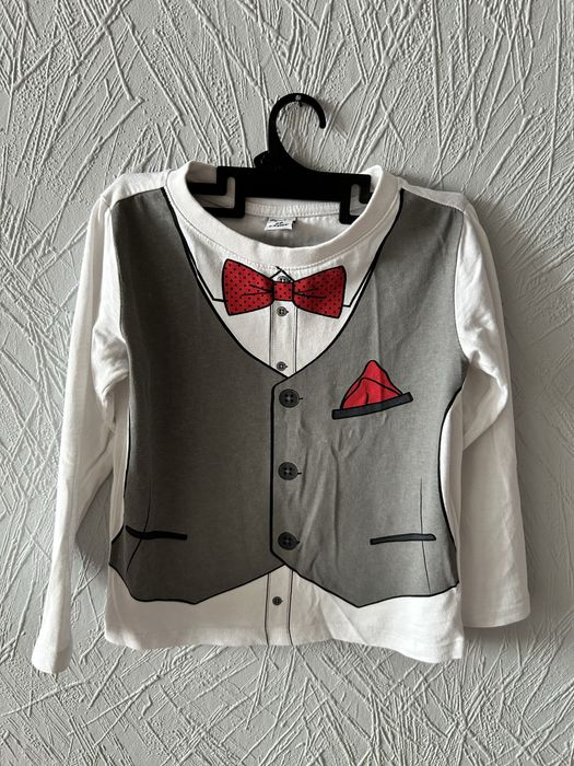 Biała bluzka elegancka galowa kamizelka muszka print poszewka guziki