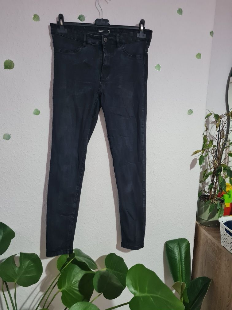 Spodnie jeansy z przetarciami sinsay xl / 42