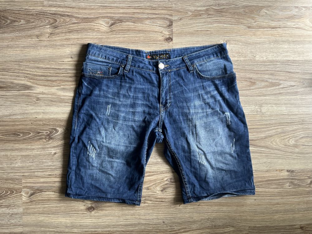 Krótkie spodenki dżinsowe marki DSQUARED, rozmiar  L