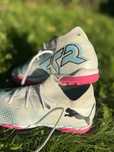 Buty piłkarskie Puma Future 7 Match TT+ Mid JR