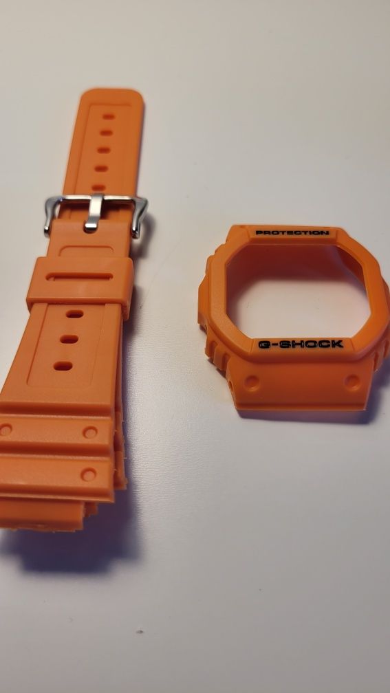 Zegarek Casio G-Shock DW-5600 bezel I pasek pomarańczowy nowy zestaw