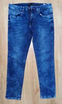 Spodnie męskie jeans Reserved r. 33