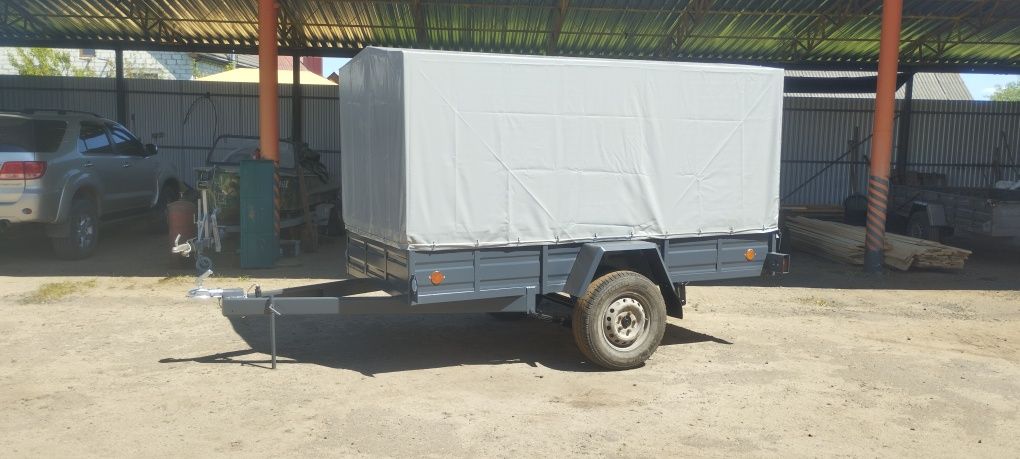 причіп до легкового автомобиля.буса.