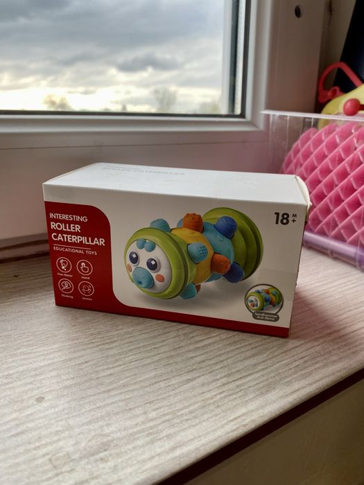 Брязкальце з пищалка і пальчикова гра Гусениця