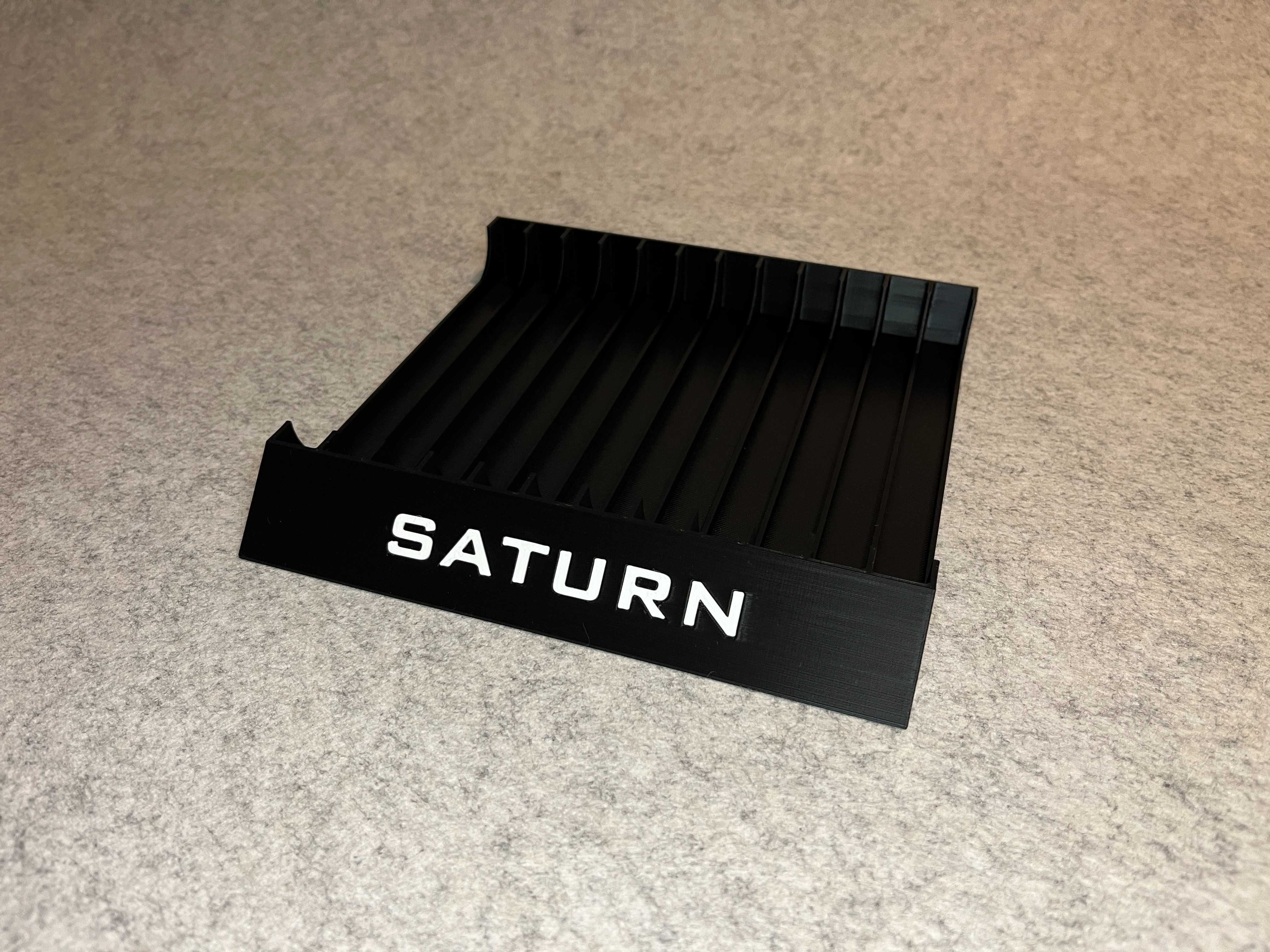 Stojak podstawka na 12 gier Sega Saturn w wersji JP