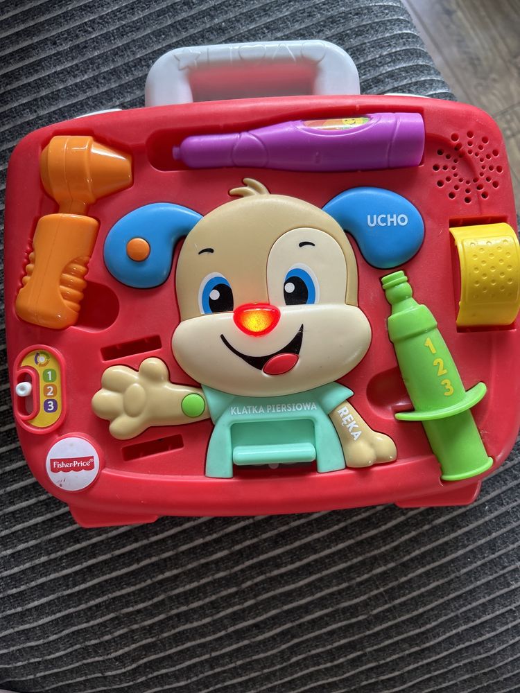 Fisher-Price Szczeniaczek u lekarza. Wersja polsko - angielska